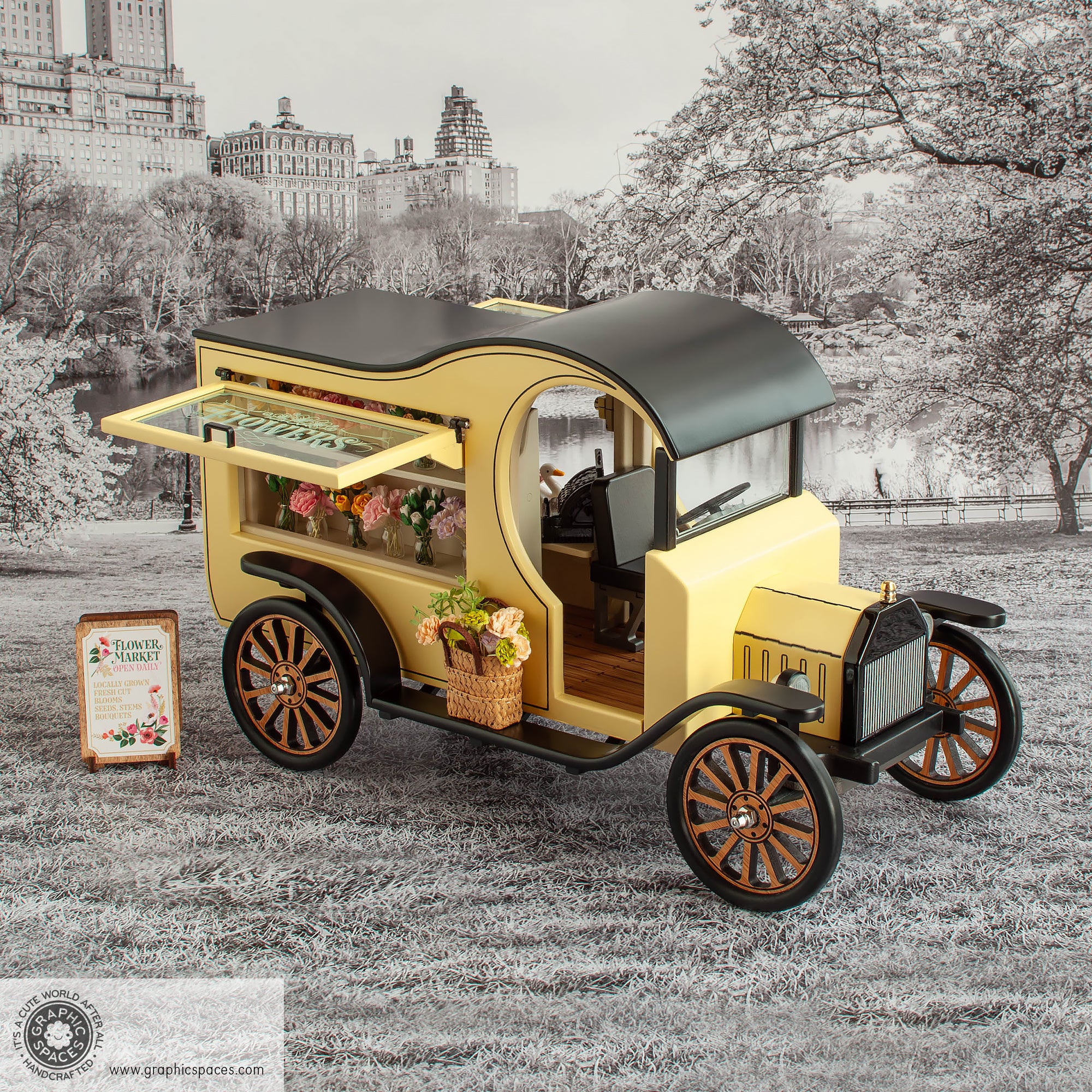 1:12 Scale Room Box Yellow Flower Shop Truck Model-T C-Cab. Passenger side view in park setting. Window displaying flowers.