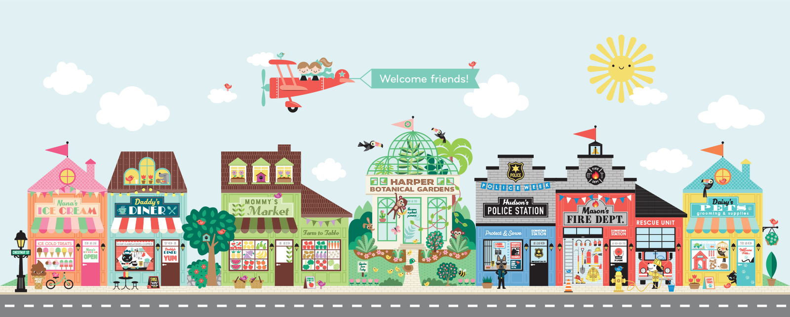 Build Your Own Town’ wall-decal scene—colourful personalised village with shops, fire station, sun & plane banner.
