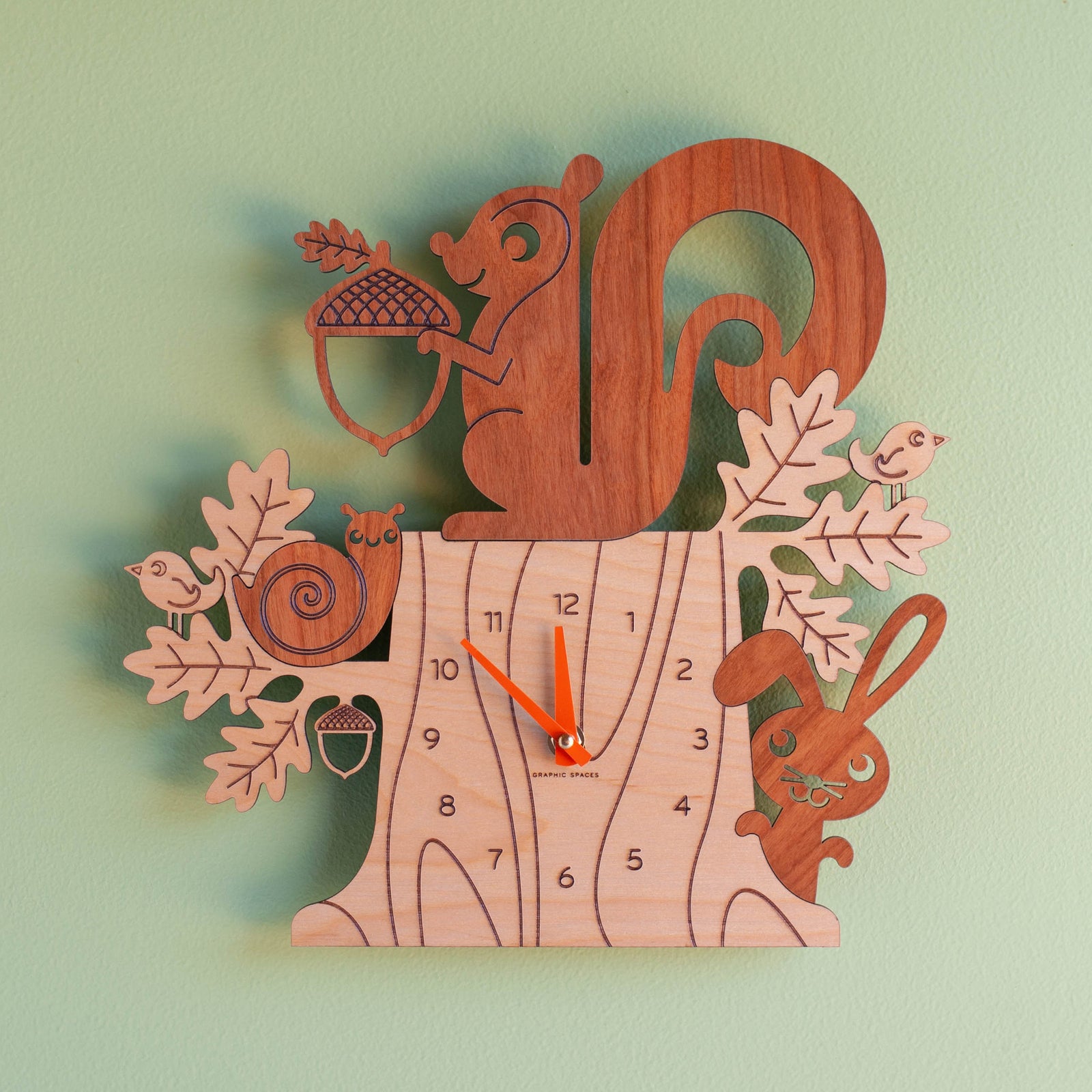 Wall Clock - Squirrel (Wood) Cherry and Maple - Chocolate Hands - Front view - Family Made in TN, USA - Graphic Spaces