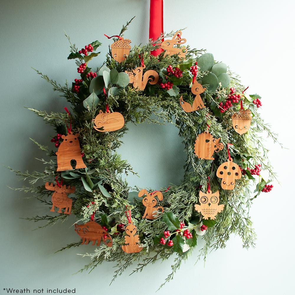 Woodland Animal Christmas Ornaments handmade in eco-friendly bamboo by Graphic Spaces displayed on Christmas tree