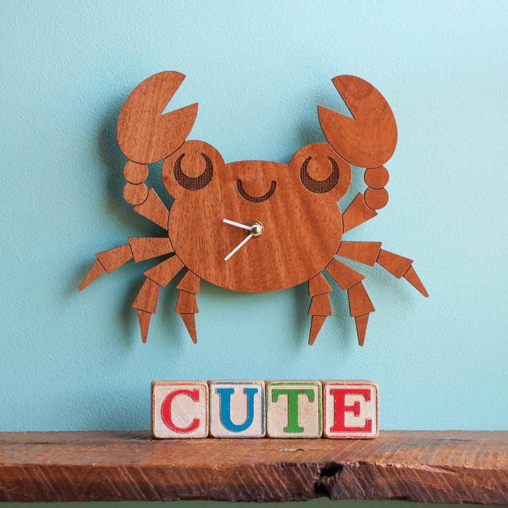 Wall Clock - Crab (Wood) Cherry - Nursery - Shown with white hands on blue wall -  Handmade in TN, USA - Graphic Spaces