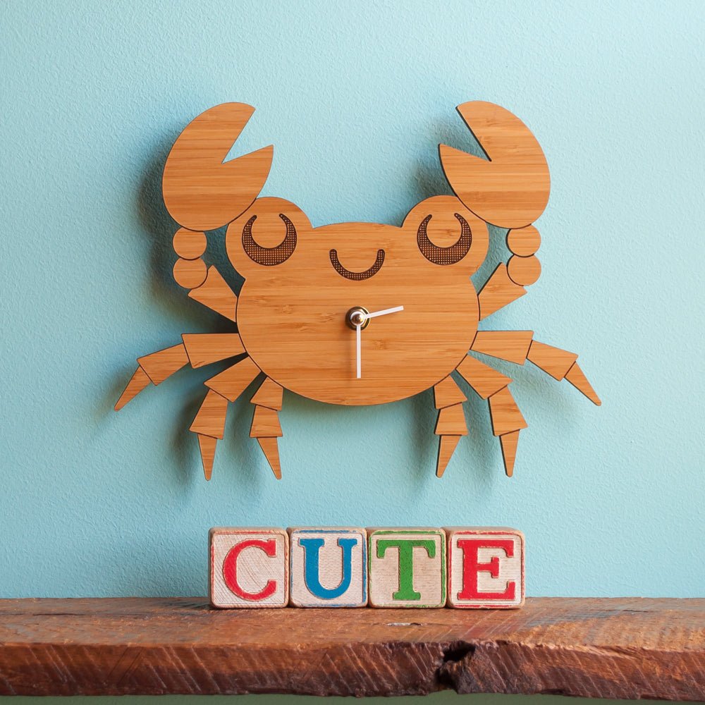 Wall Clock - Crab (Wood) Cherry - Nursery - Shown with white hands on blue wall -  Handmade in TN, USA - Graphic Spaces