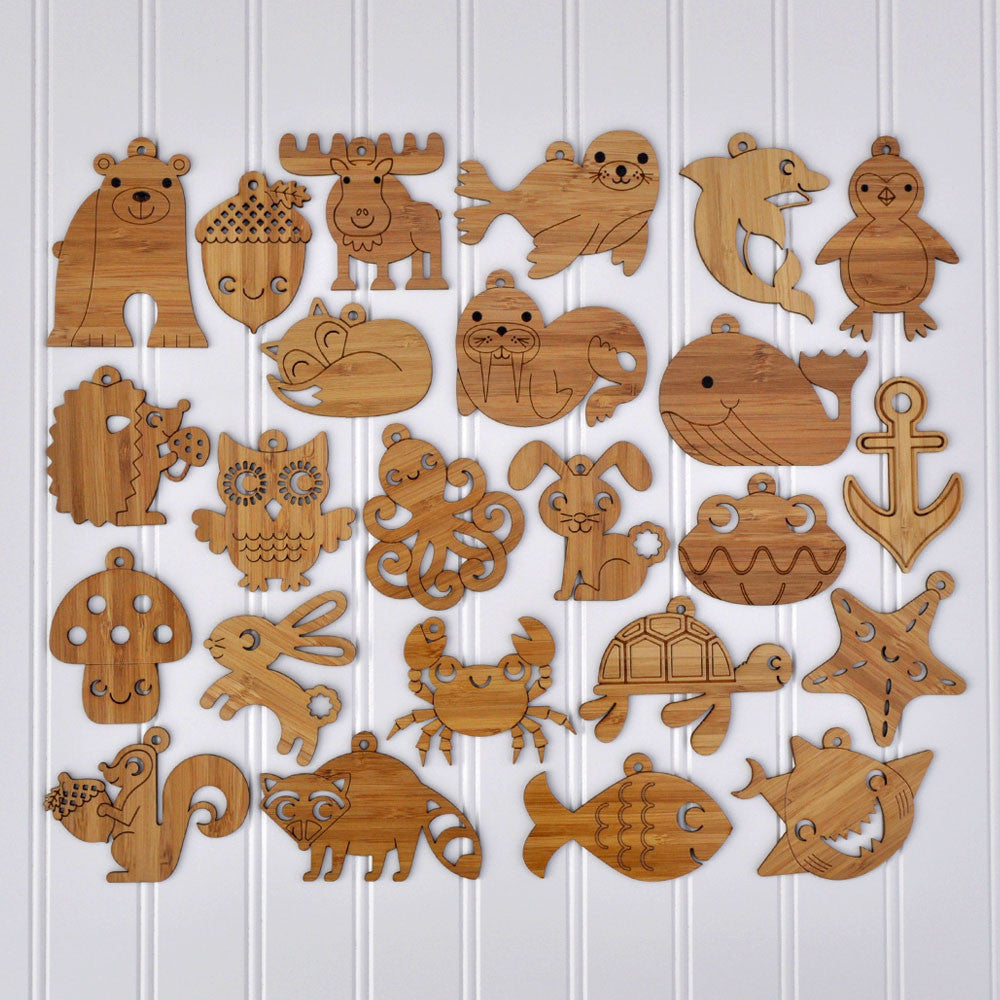 Wooden Animal Christmas Ornaments handmade in eco-friendly bamboo in woodland &amp; ocean themes by Graphic Spaces